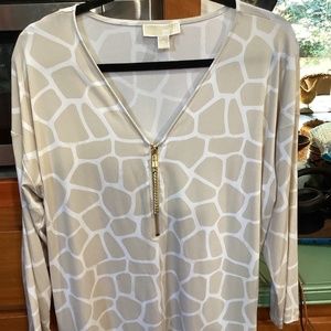 Female micheal kors blouse ,size extra large